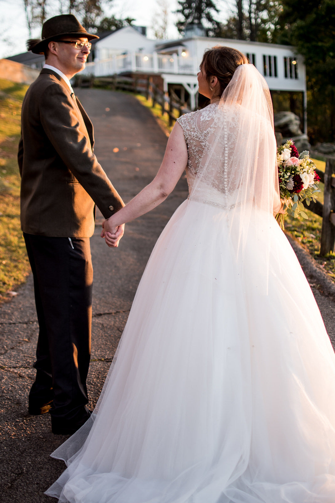 farmhouse wedding with bride in glitter rhinestone bridal veil