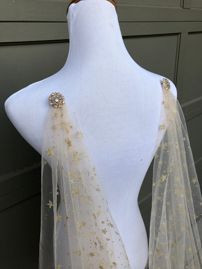 gold star bridal cape veil on mannequin for grecian brides