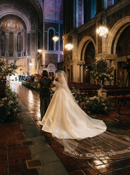 New York cathedral wedding with extra long embroidered phrase bridal veil