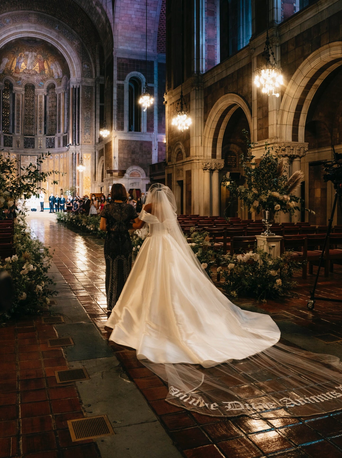 New York cathedral wedding with extra long embroidered phrase bridal veil