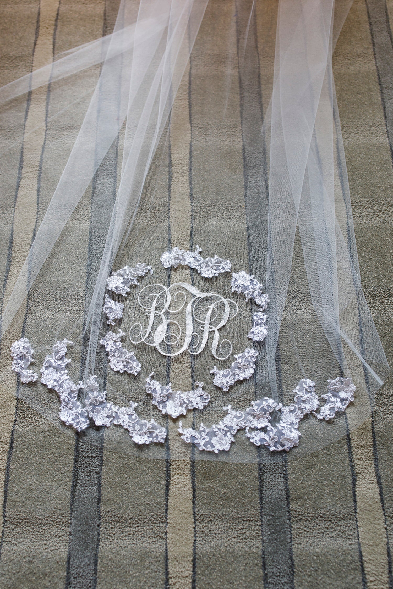 long wedding veil with lace appliques and monograms