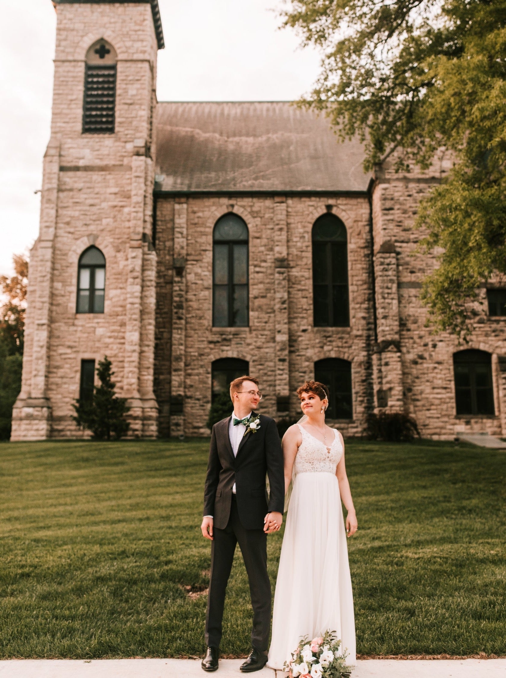 church wedding with curly short haired bride in simple accessories