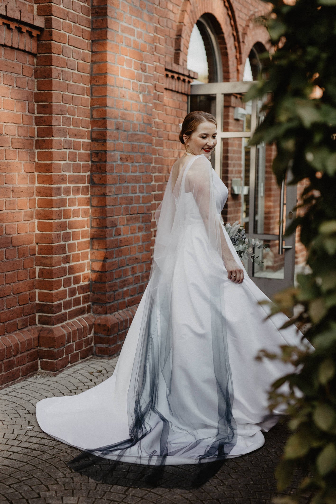 ombre blue colored wedding cape veil on crepe wedding dress