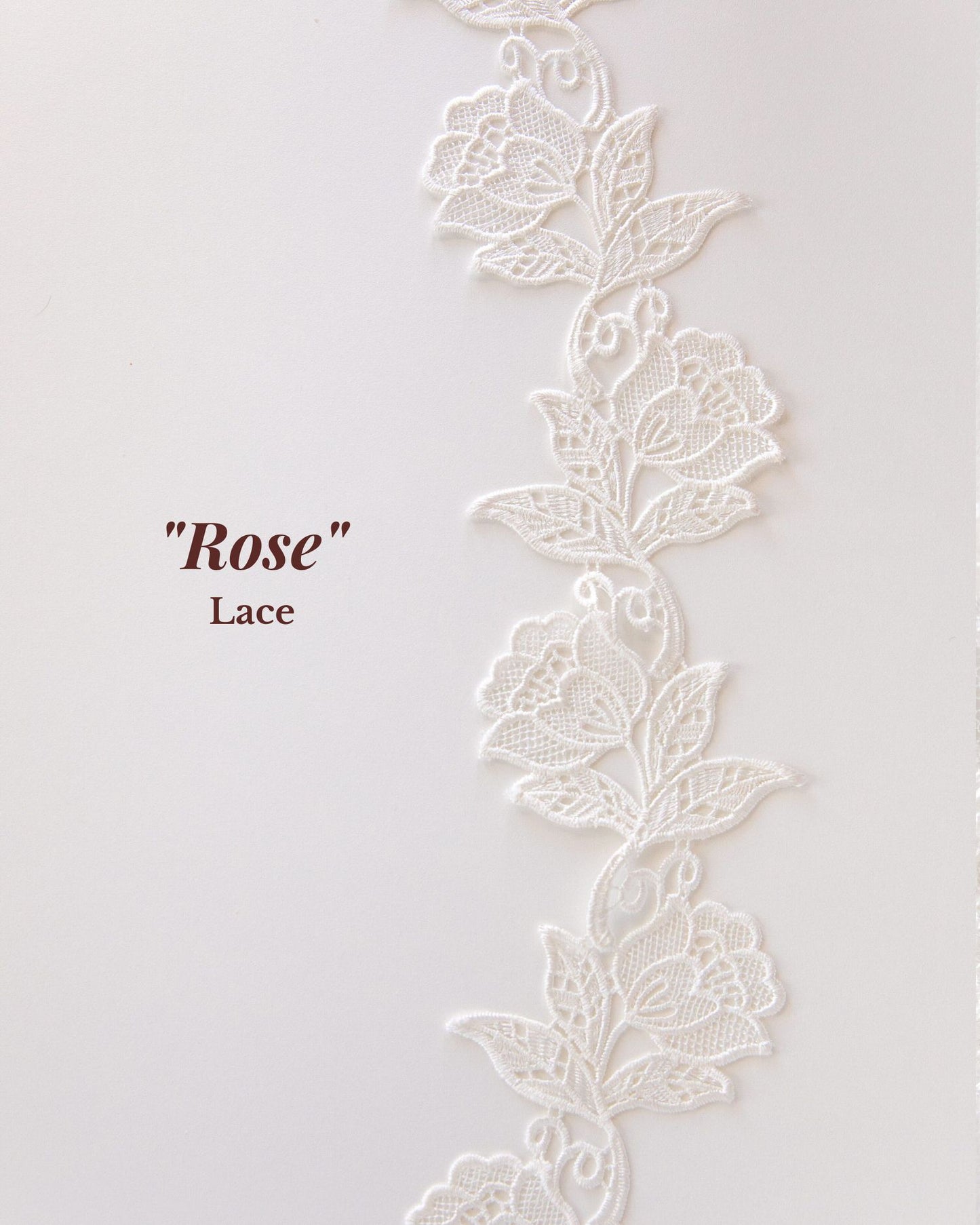 bold Venice lace in rose and leaf design for outdoor garden wedding