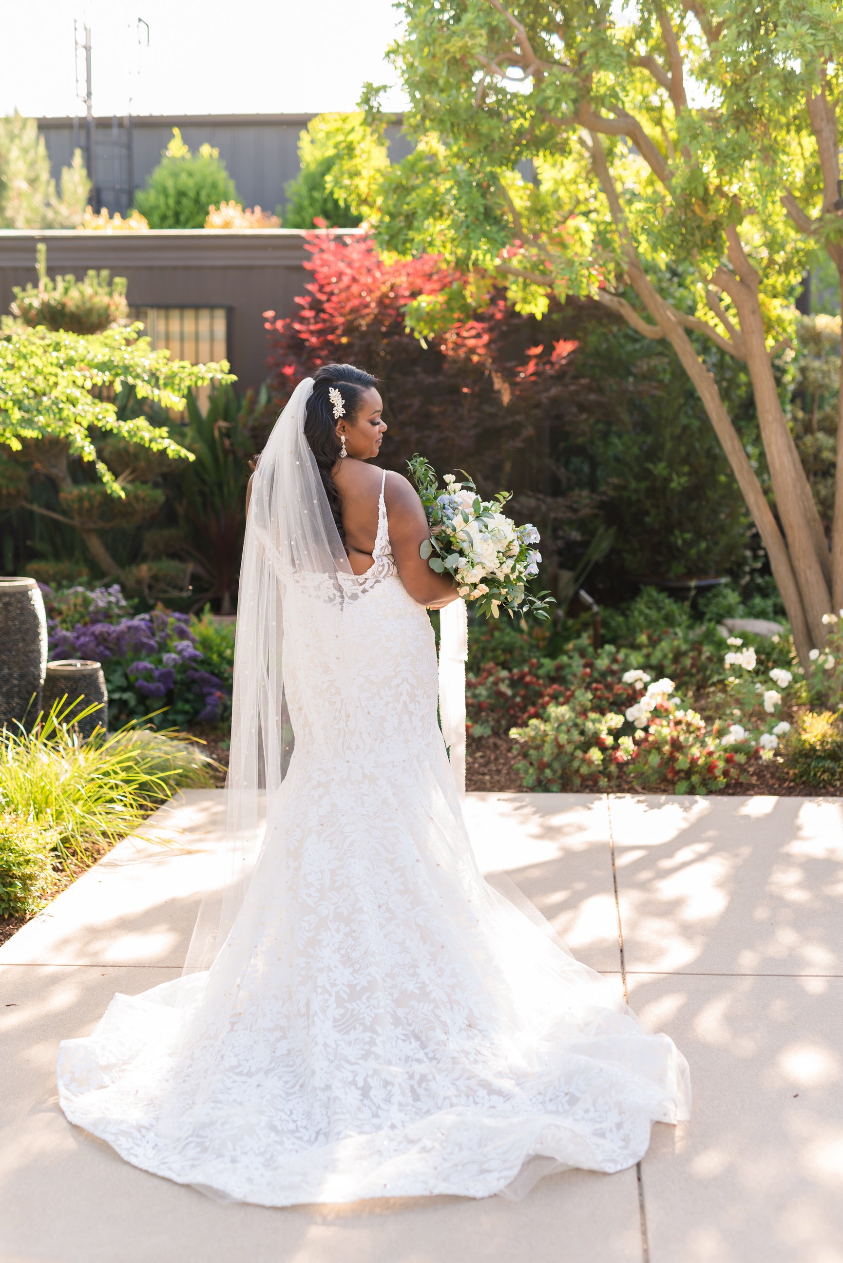 dramatic cathedral length bridal veil for glam bride in low backed wedding dress
