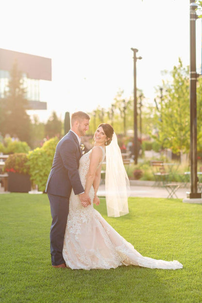 post wedding with bride in simple raw edge wedding veil