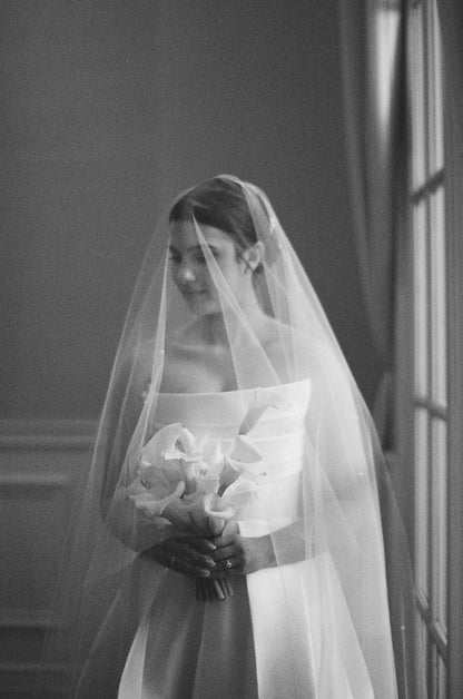 modest drop wedding veil with scattered beading and two tier bridal veil over low updo